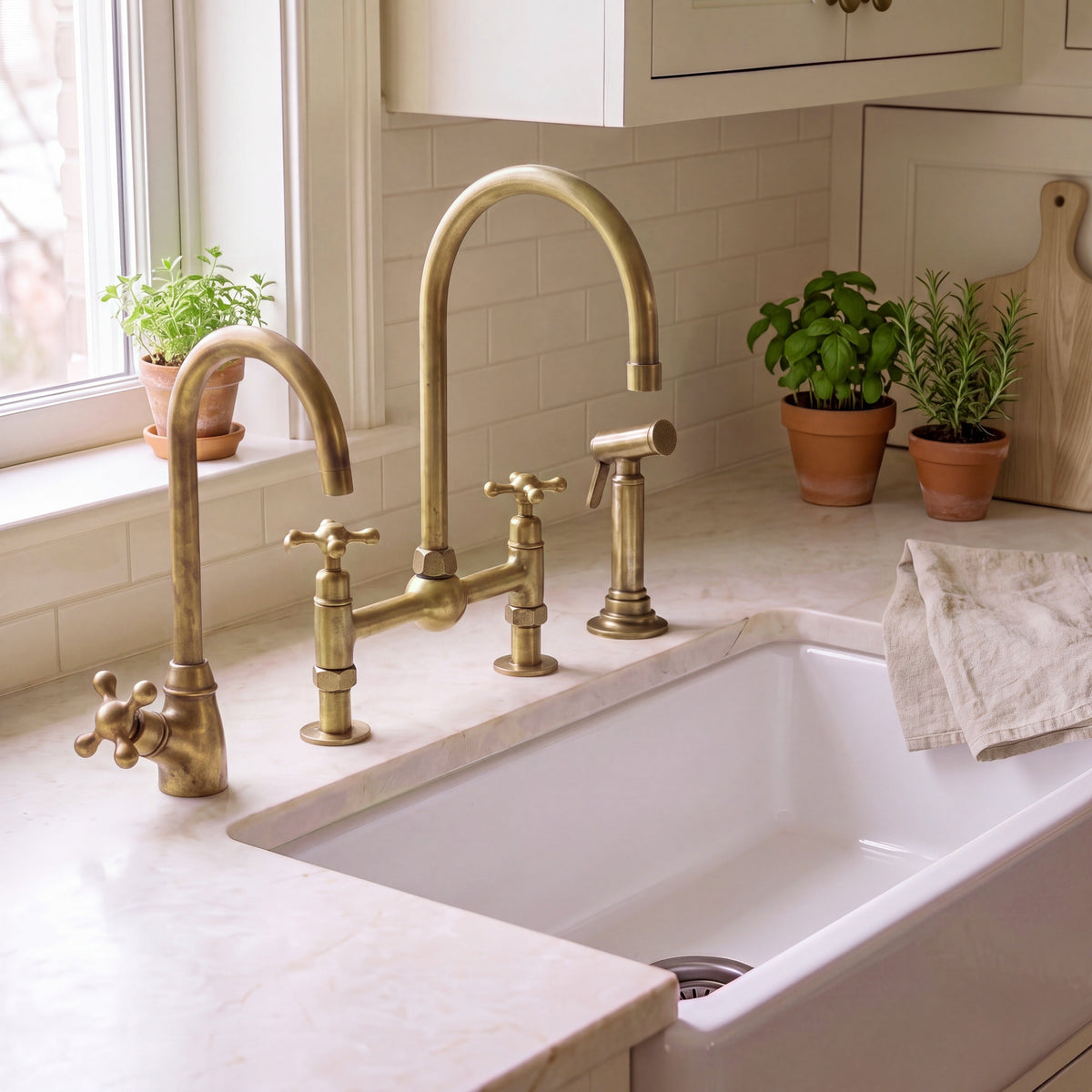 Unlacquered brass bridge kitchen faucet with side sprayer and cold water dispenser